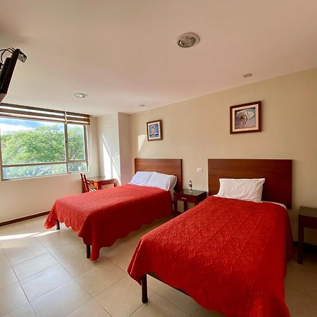 Hotel Carrion Loja Quarto foto