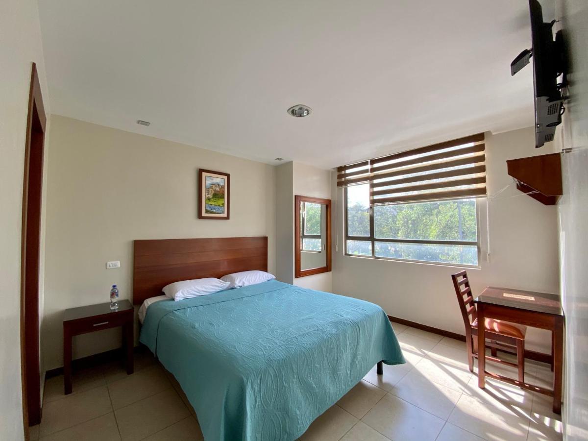 Hotel Carrion Loja Quarto foto