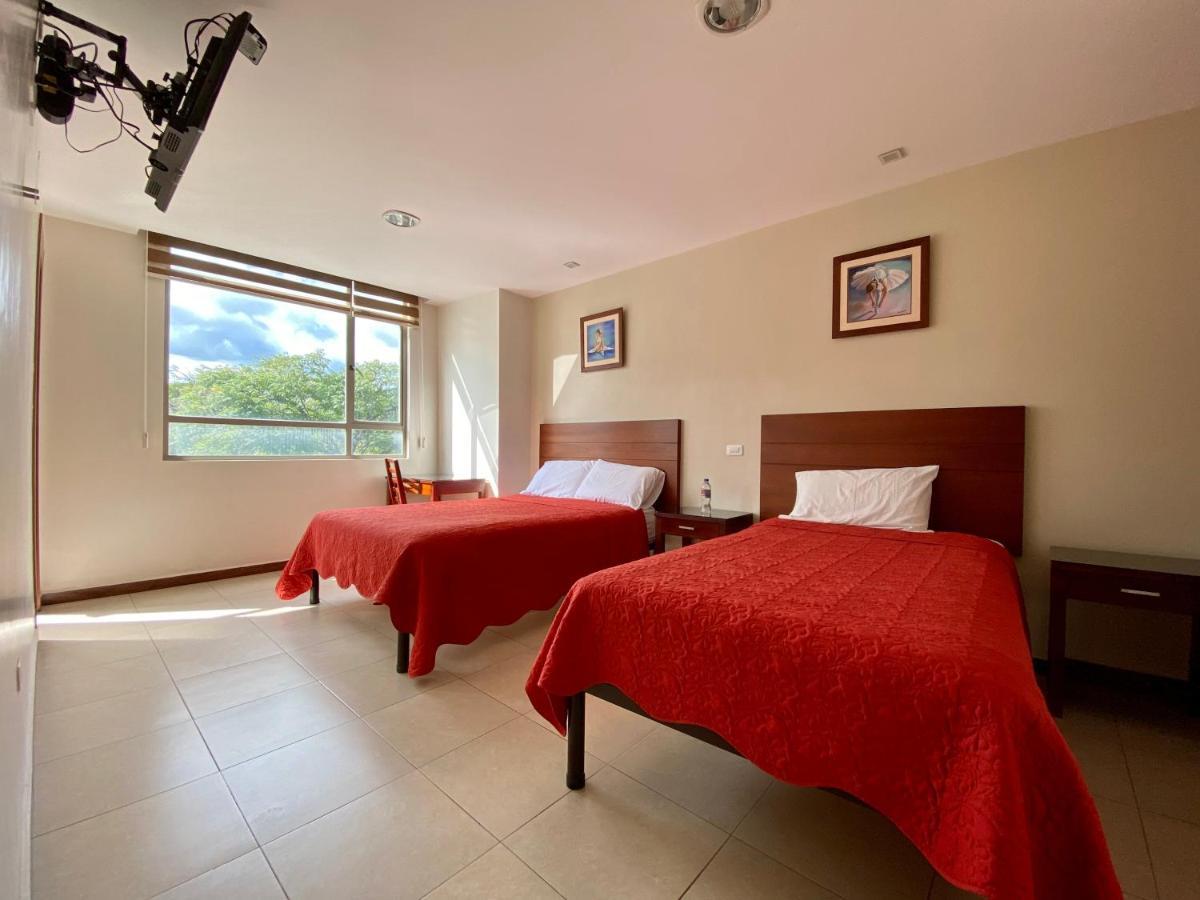 Hotel Carrion Loja Quarto foto