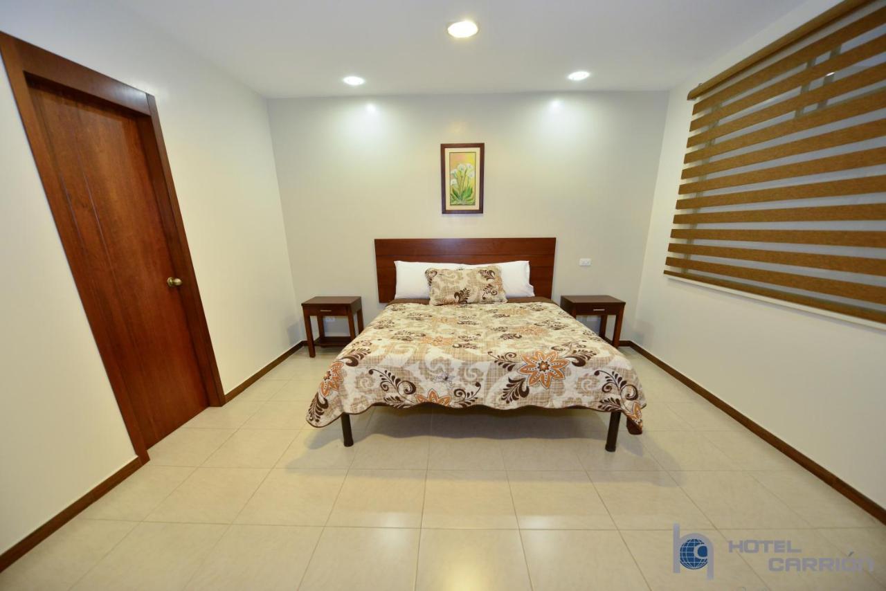 Hotel Carrion Loja Quarto foto