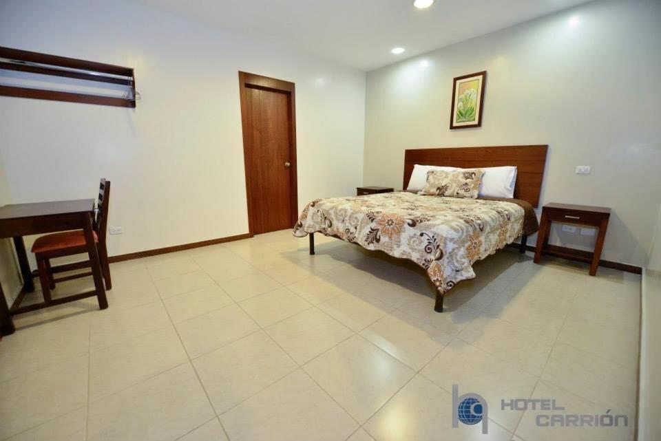 Hotel Carrion Loja Quarto foto