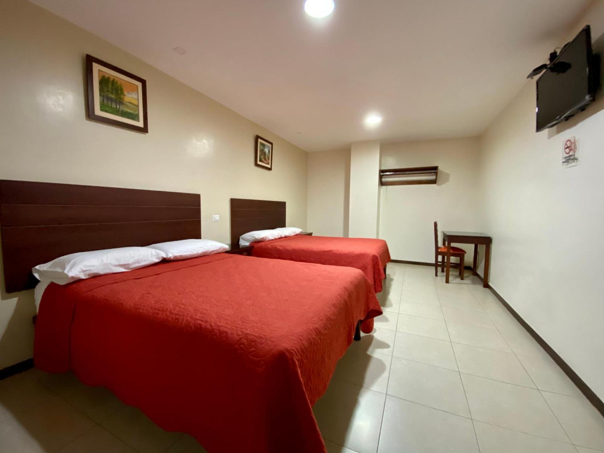 Hotel Carrion Loja Quarto foto