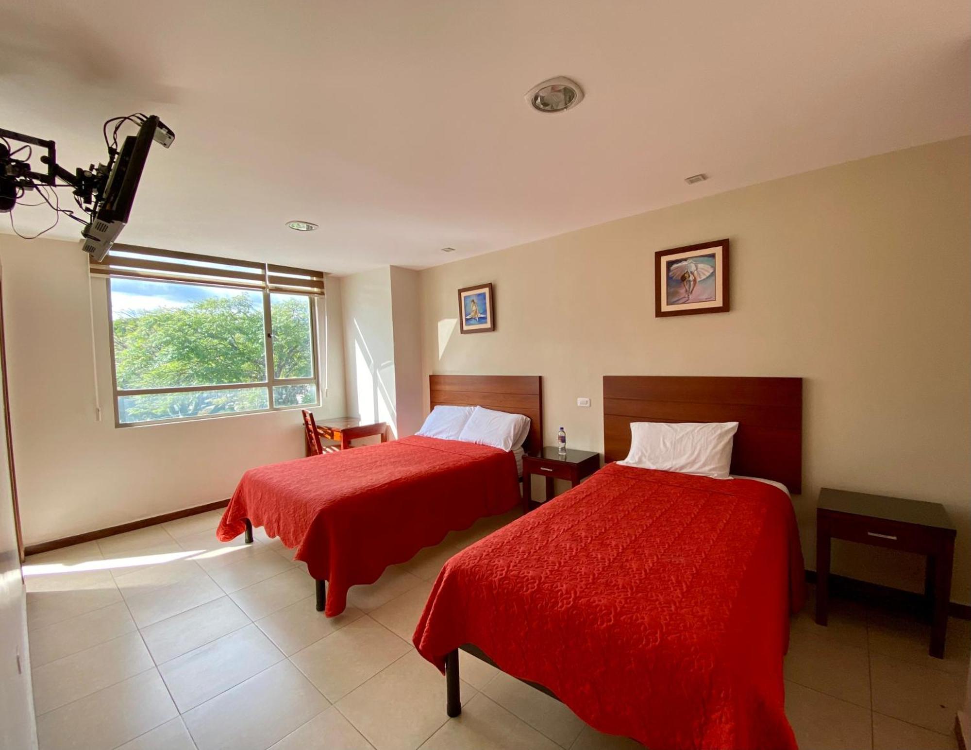 Hotel Carrion Loja Quarto foto