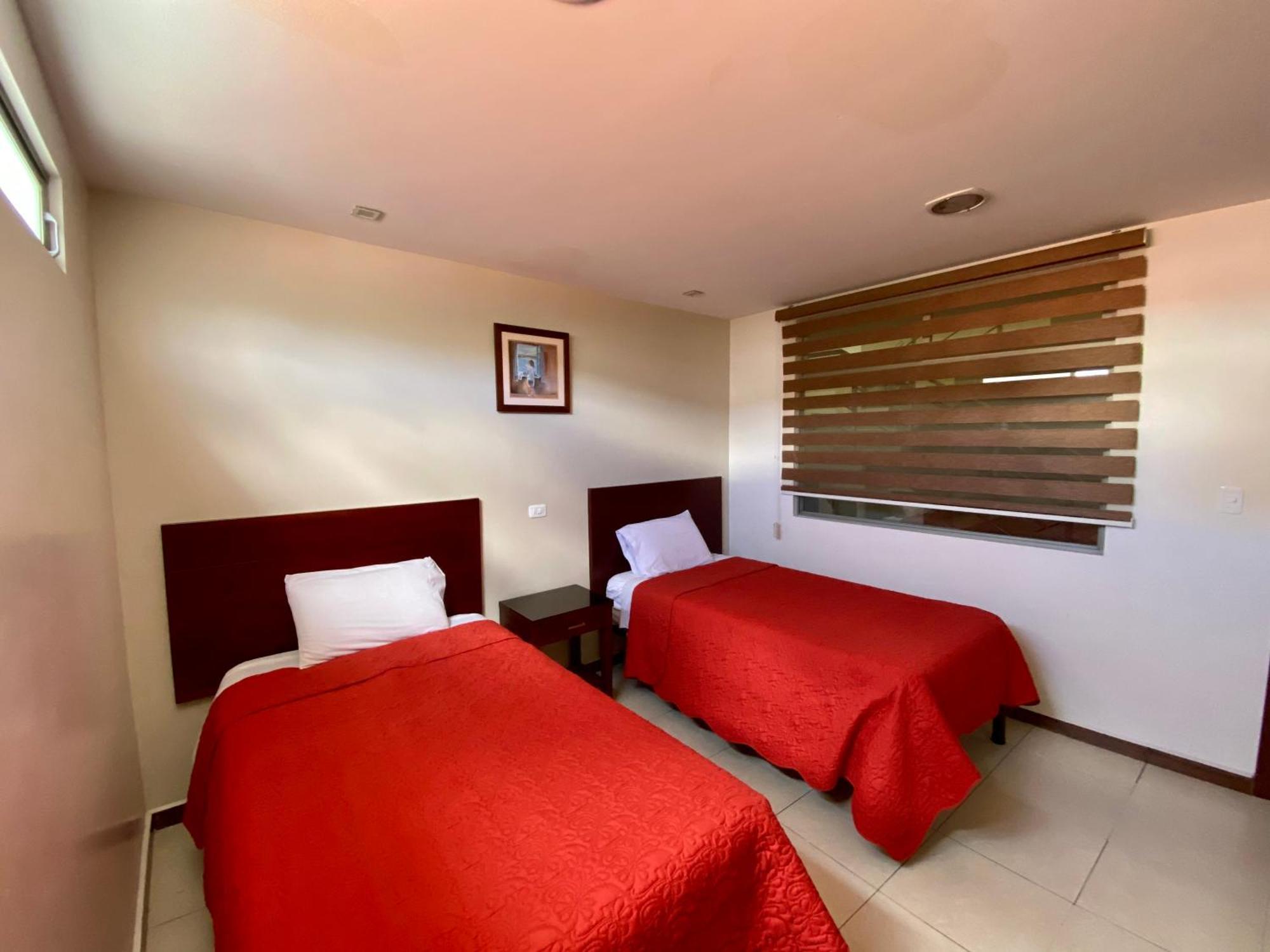 Hotel Carrion Loja Quarto foto