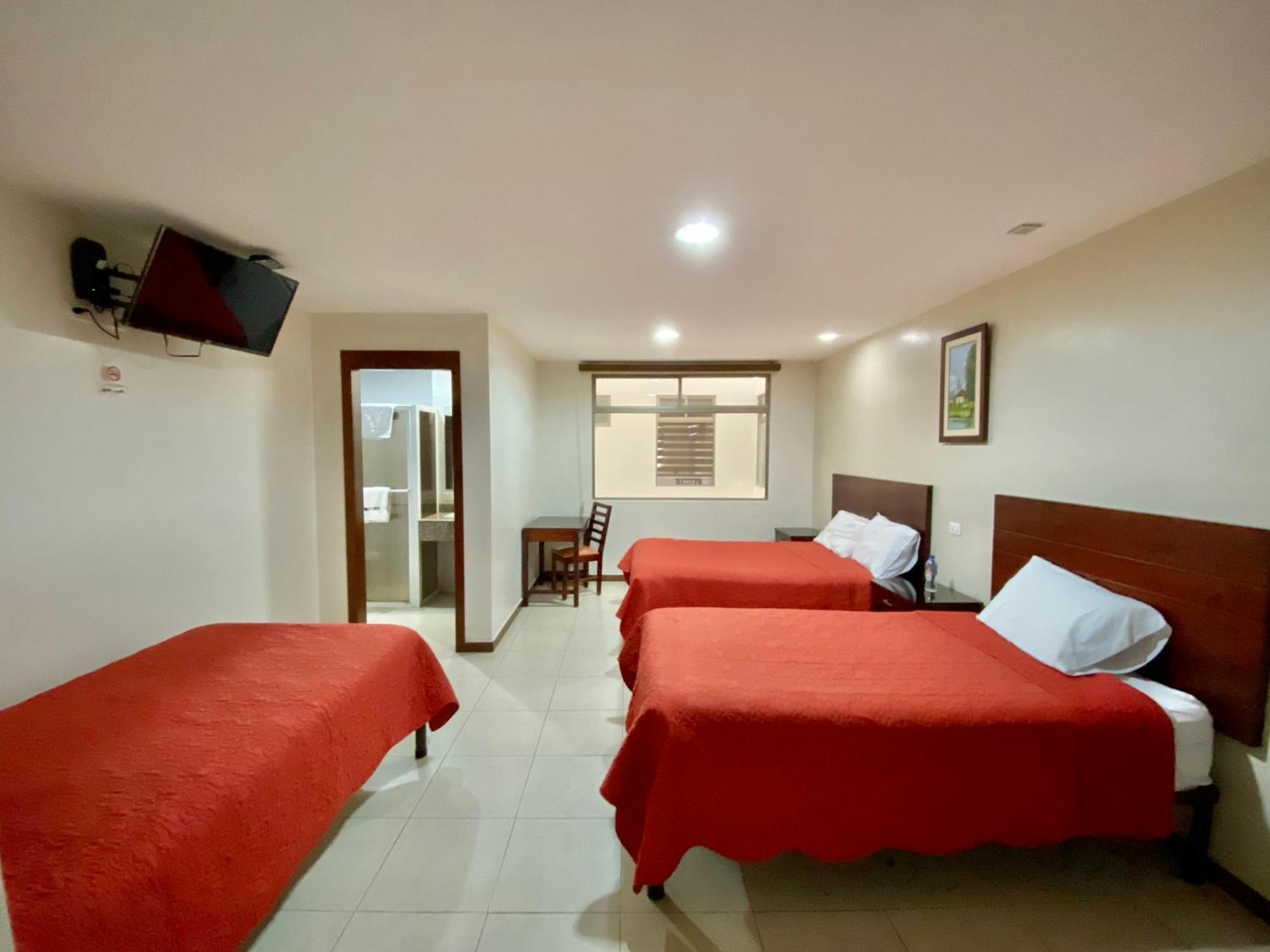 Hotel Carrion Loja Quarto foto