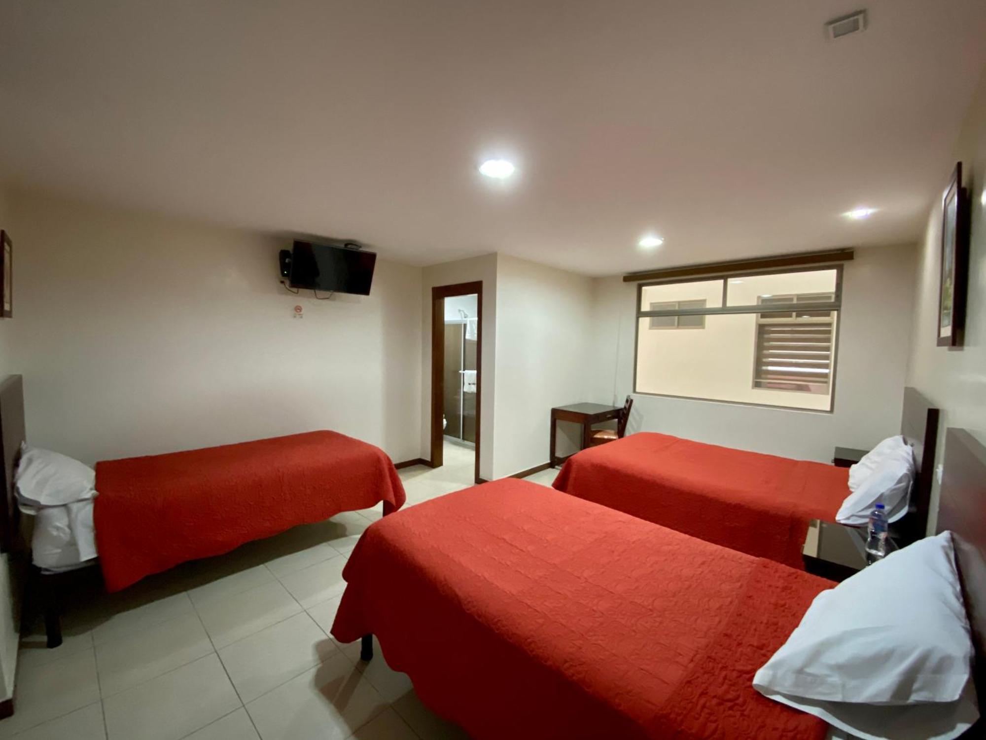 Hotel Carrion Loja Quarto foto