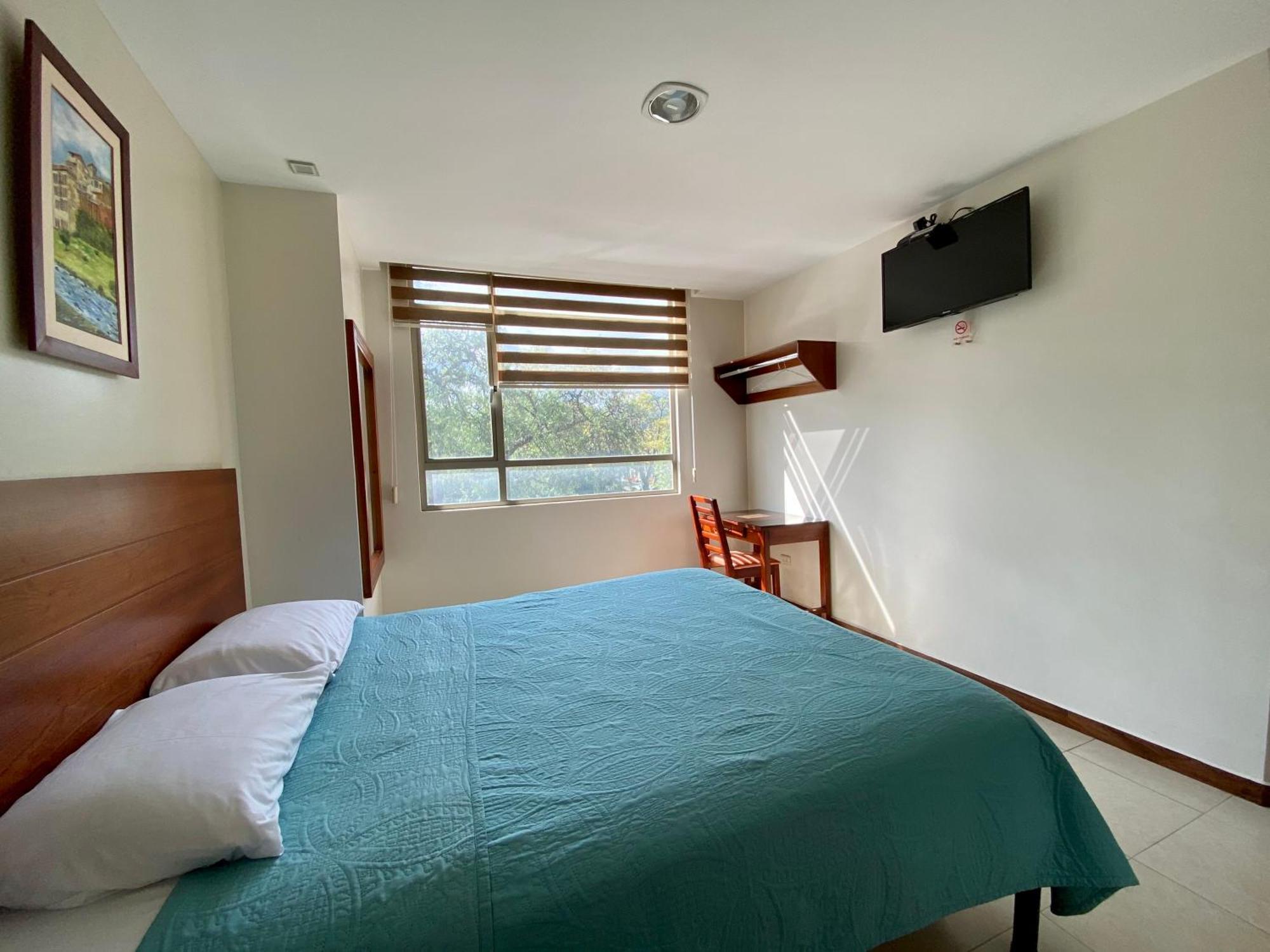 Hotel Carrion Loja Quarto foto